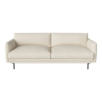 Stylish cream sofa with smooth, minimalist design and subtle texture, featuring a sleek black metal frame.