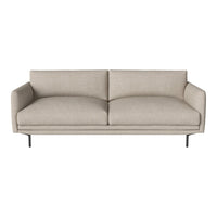 Light beige upholstered sofa with minimalistic design and smooth fabric. Sleek, modern silhouette with black legs.