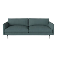 Teal fabric sofa with a stitched texture, featuring a minimalist design and sleek metal legs. Ideal for modern decor.