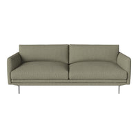 Olive green sofa with smooth, textured fabric and sleek metal legs. Minimalist design complements modern decor.