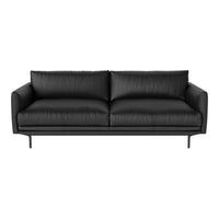 Sleek black leather sofa with smooth texture and modern design, featuring minimalist lines and no patterns.