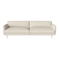 Elegant cream sofa with a smooth upholstery pattern and sleek metal legs, perfect for modern interior decor.
