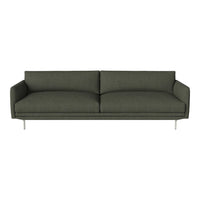 Modern green sofa with a minimalist design and smooth, textured upholstery, featuring sleek silver legs.