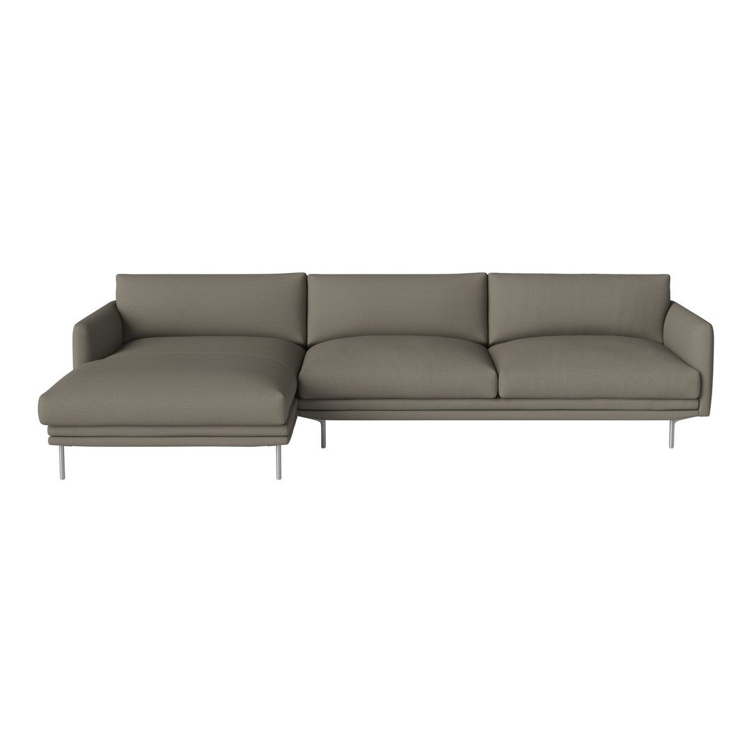 Modern sectional sofa in soft taupe fabric with smooth lines and minimalistic design, complemented by silver legs.