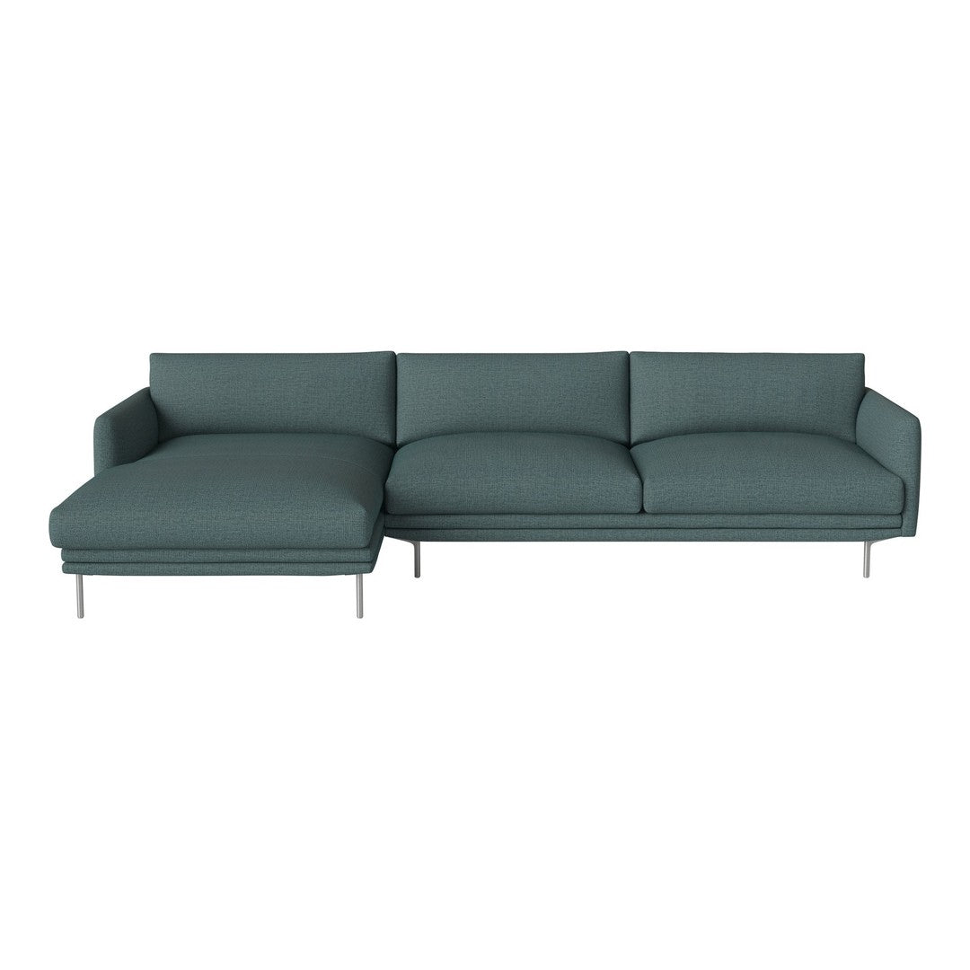 Teal sectional sofa with a modern design, featuring sleek lines and smooth fabric upholstery for a contemporary look.