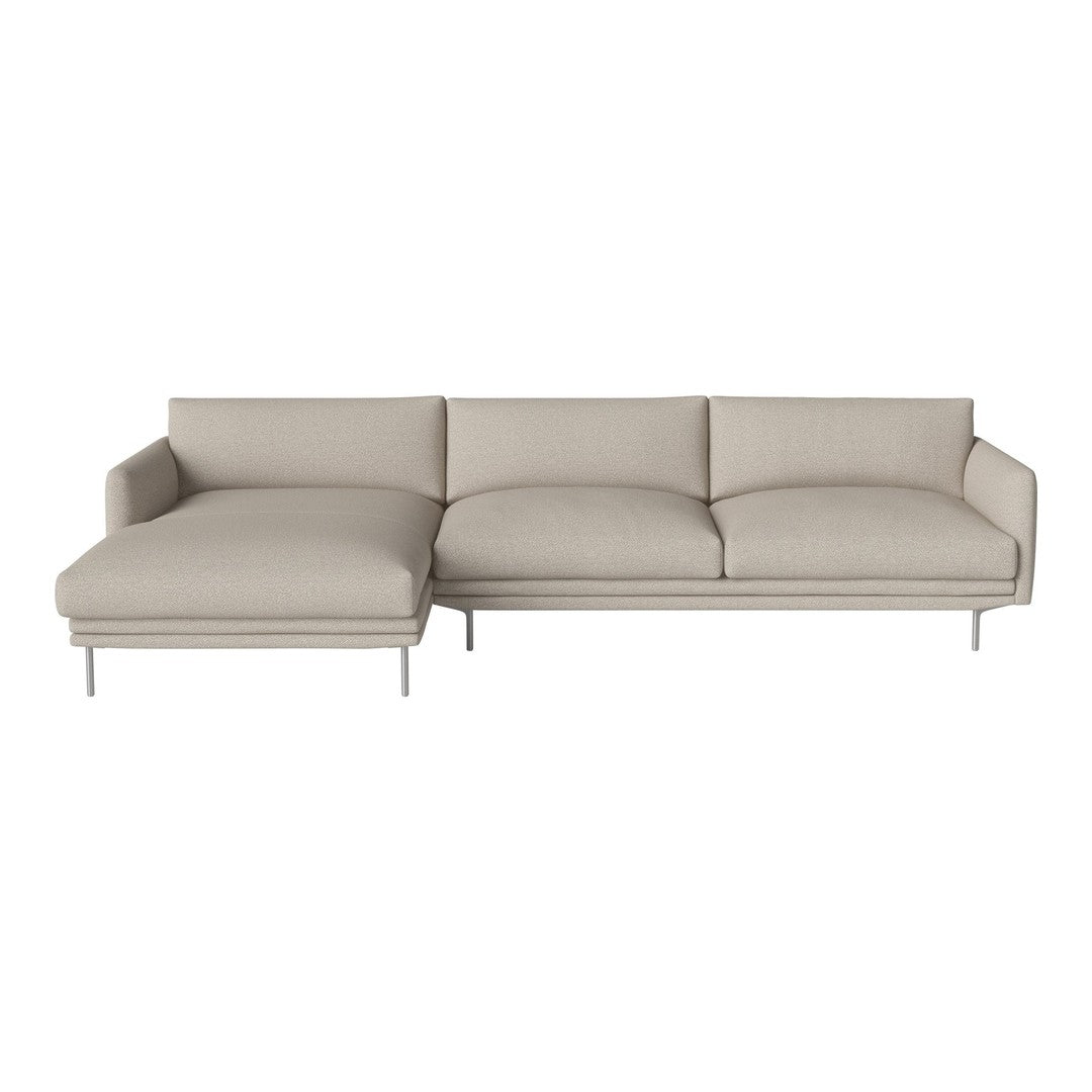Beige sectional sofa with soft fabric and clean lines, featuring a minimalist design and modern metal legs.