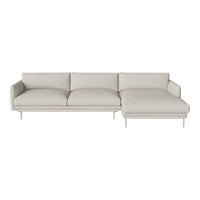 Light beige sectional sofa with a smooth, minimalist design and clean lines, perfect for modern decor.
