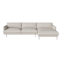 Light beige sectional sofa with a minimalist design and textured fabric, featuring solid metal legs for modern appeal.