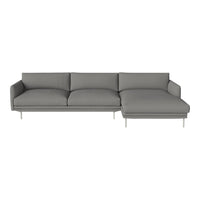 Stylish gray sectional sofa with smooth fabric and minimalist, modern design. Perfect for contemporary living spaces.