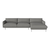 Modern gray sectional sofa with clean lines and smooth fabric upholstery. Minimalist design with metal legs.