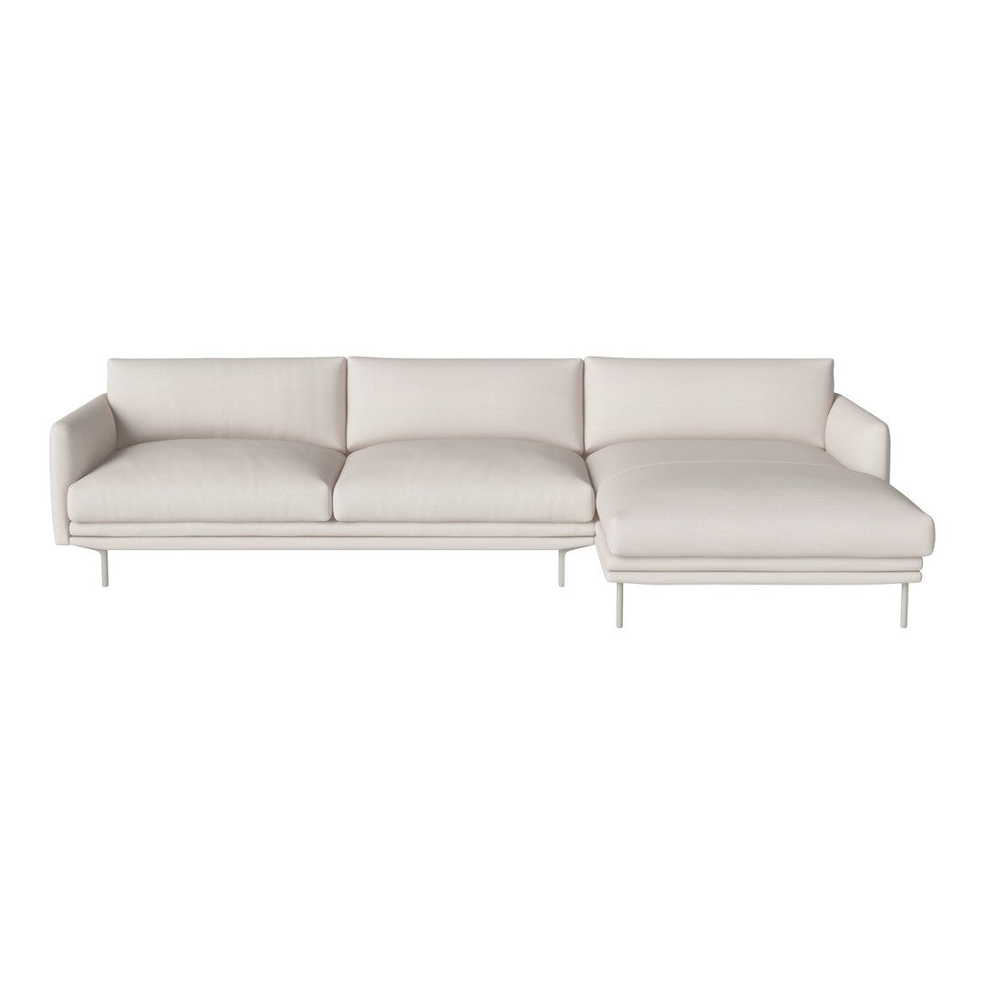 Light beige sectional sofa with clean lines and plush cushions on sleek metal legs, perfect for modern decor.