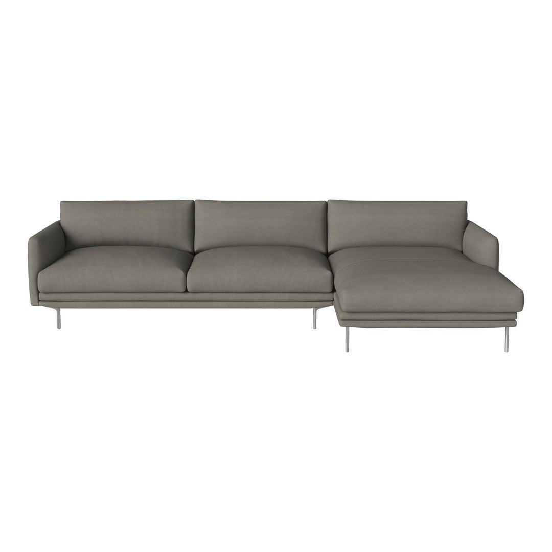 Modern grey sectional sofa with clean lines and a minimalist design, featuring soft upholstery and metal legs.