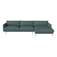 Teal upholstered sectional sofa with a sleek, modern design and subtle textured fabric. Perfect for contemporary decor.