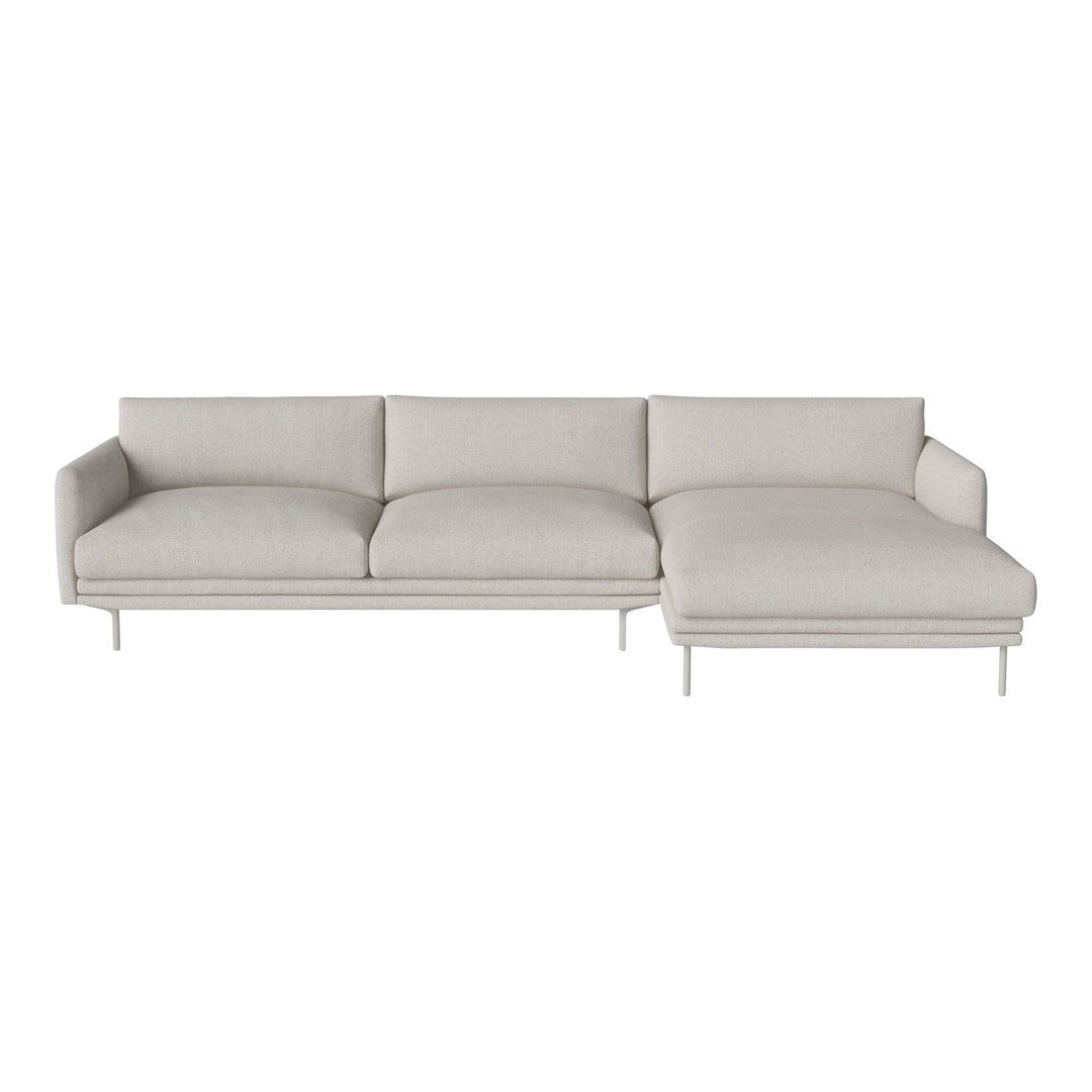 Modern light gray sectional sofa with plush cushions and sleek metal legs, featuring a minimalistic design and smooth texture.