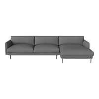 Modern gray sectional sofa with smooth fabric and minimalist design, featuring plush cushions and sleek metal legs.