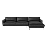 Stylish black leather sectional sofa with sleek lines and minimalist design, perfect for modern living spaces.