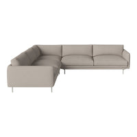 Light beige sectional sofa with smooth upholstery and minimalist design, featuring clean lines and subtle elegance.