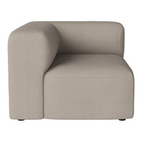 Beige modern corner chair with a smooth, minimalist design and soft upholstery, perfect for contemporary interiors.