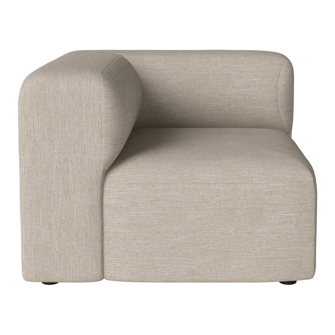 Beige textured corner sofa with a minimalist design and smooth, rounded edges. Perfect for modern decor.