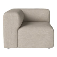Beige textured corner sofa with a minimalist design and smooth, rounded edges. Perfect for modern decor.