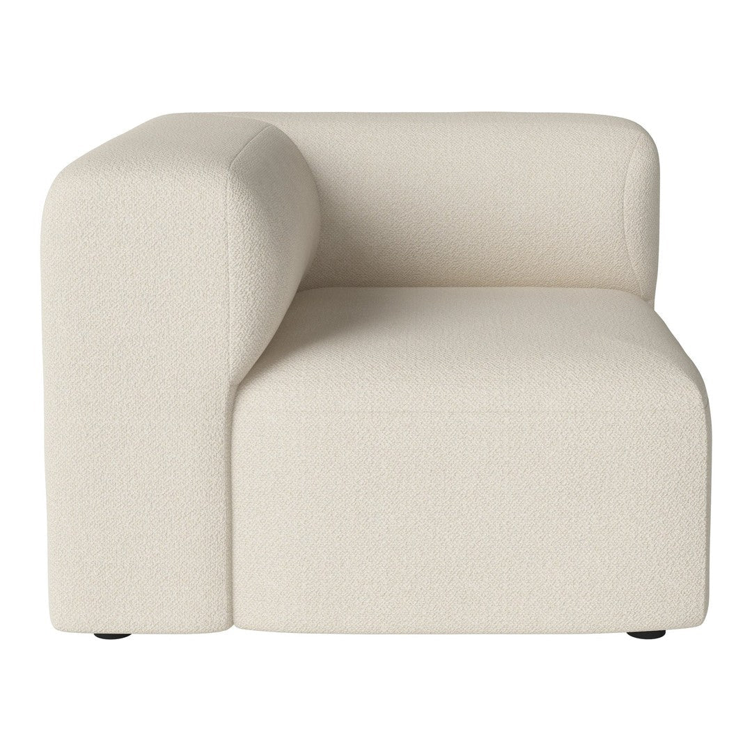 Cream-colored curved accent chair with a textured fabric, minimalist design, and seamless pattern.