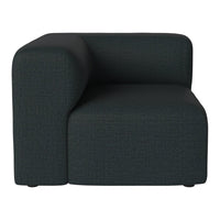 Dark green textured sofa with a minimalist design and smooth curves, perfect for modern decor.