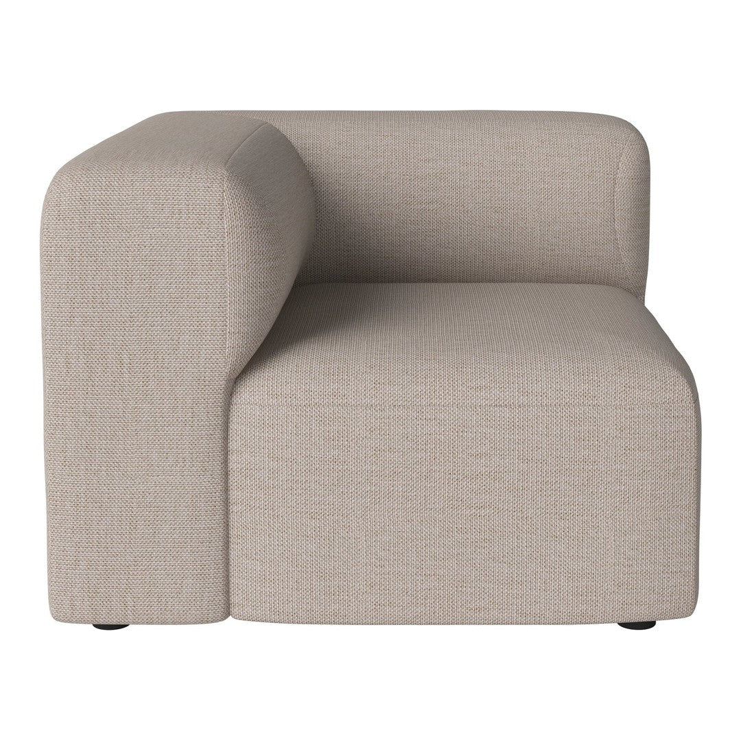 Beige textured modular sofa with a minimalist design and curved arm, perfect for modern decor.