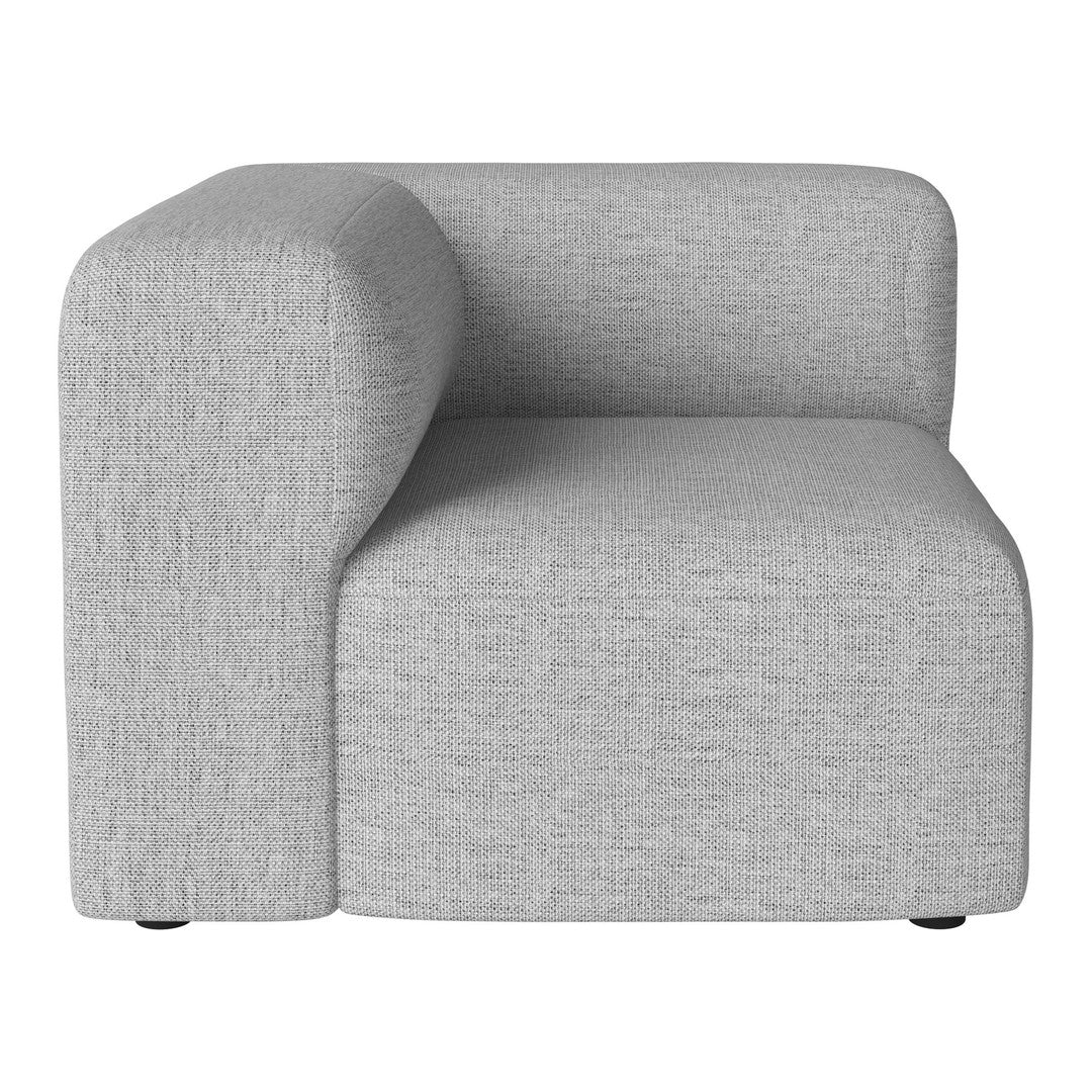 Gray fabric corner chair with a smooth texture and minimalist design, perfect for modern interiors.