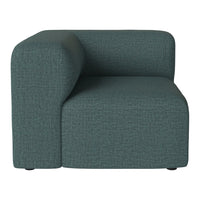 Teal upholstered corner sofa with a subtle textured pattern, adding modern elegance to any space.