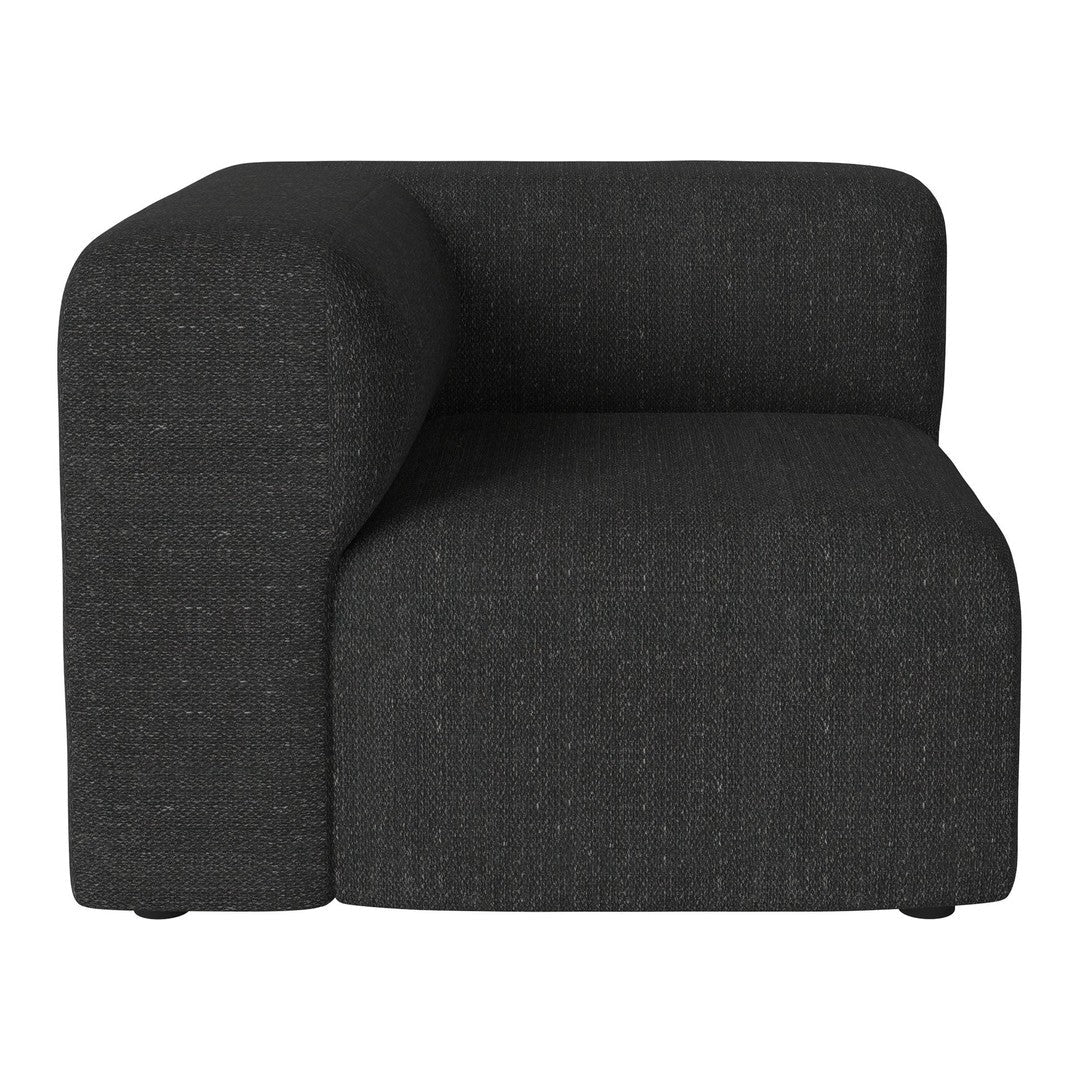 "Modern L-shaped armchair in solid dark charcoal fabric with subtle texture."