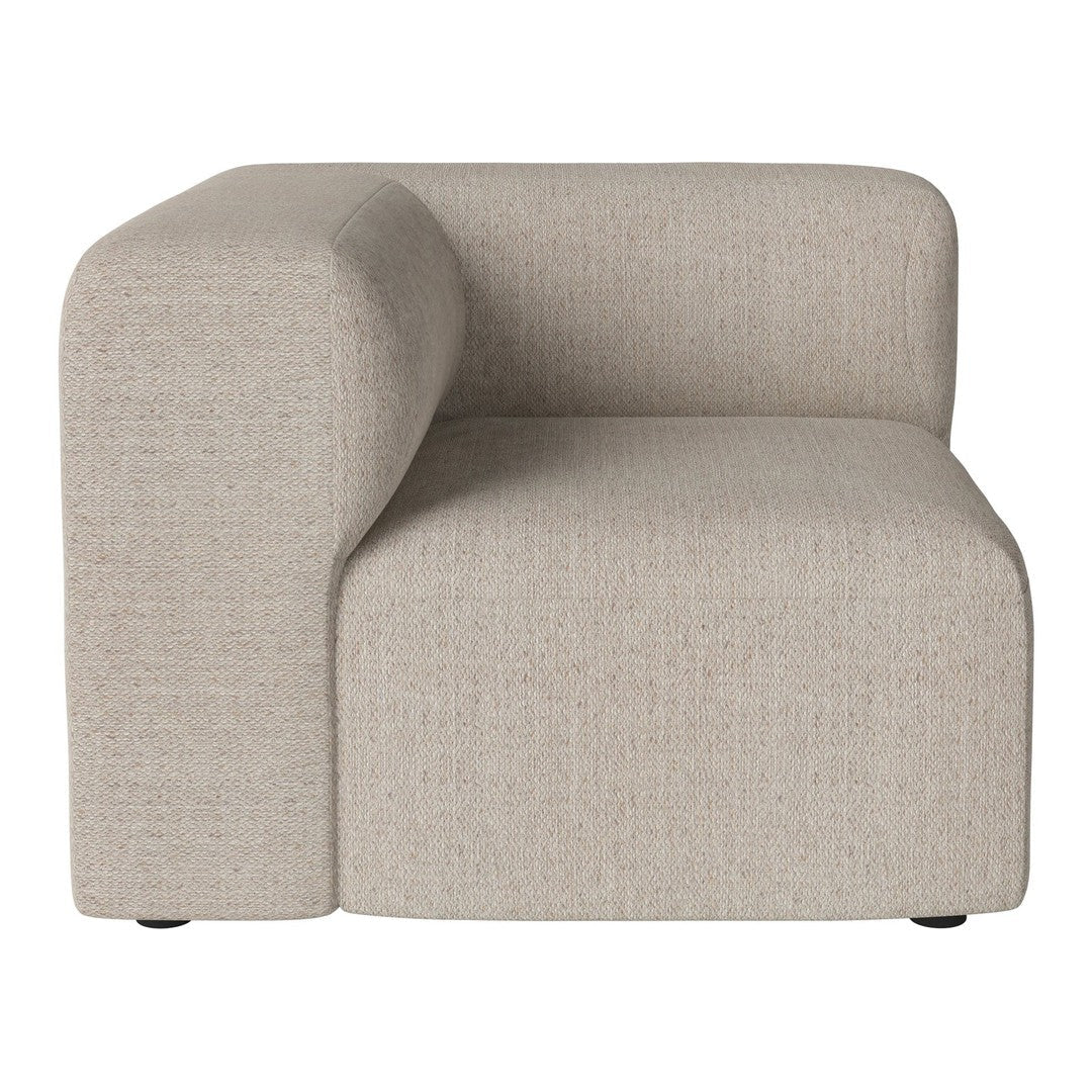 Beige upholstered corner sofa with a textured, minimalist design, featuring soft, neutral tones. Perfect for modern decor.