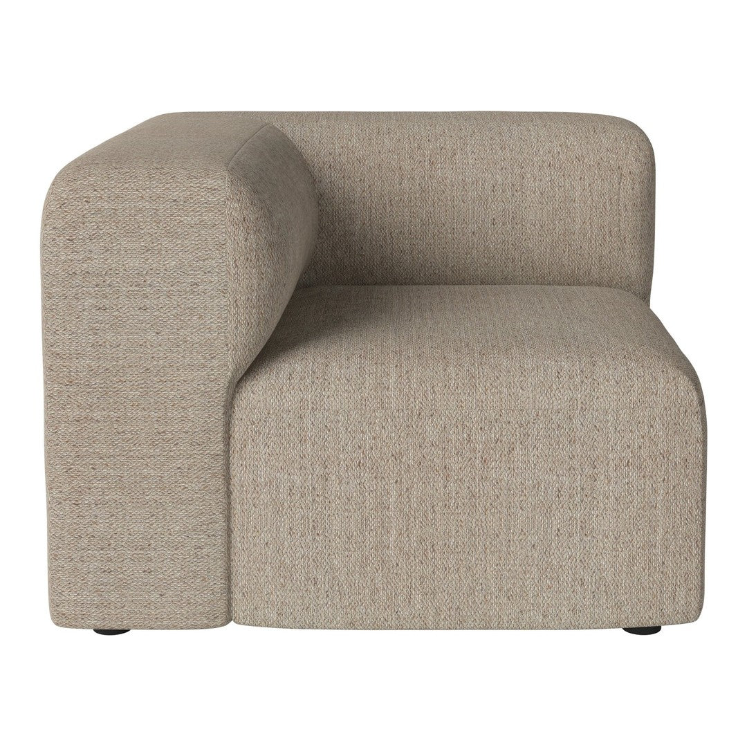 Beige upholstered corner chair with subtle textured pattern, ideal for contemporary living spaces.