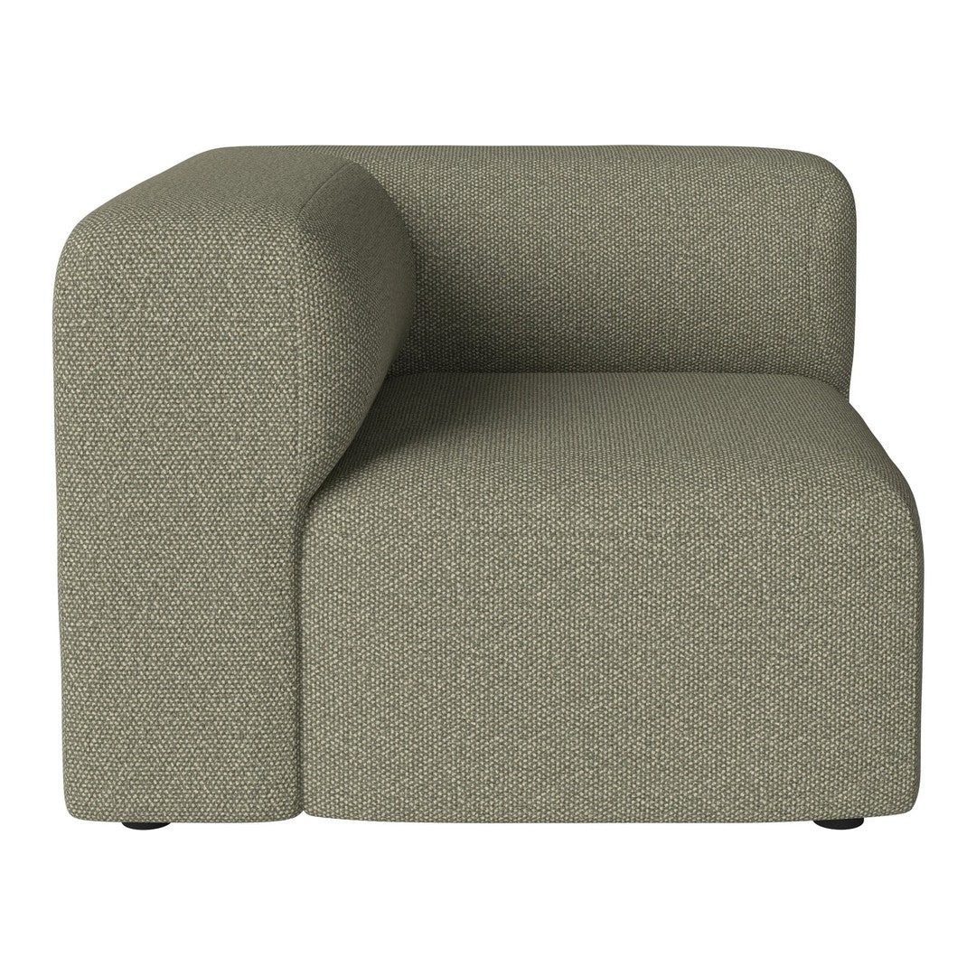 Modern green corner sofa with textured fabric and minimalist design. Ideal for contemporary living spaces.