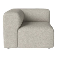 Light gray upholstered corner chair with a soft, textured finish and clean, modern lines.