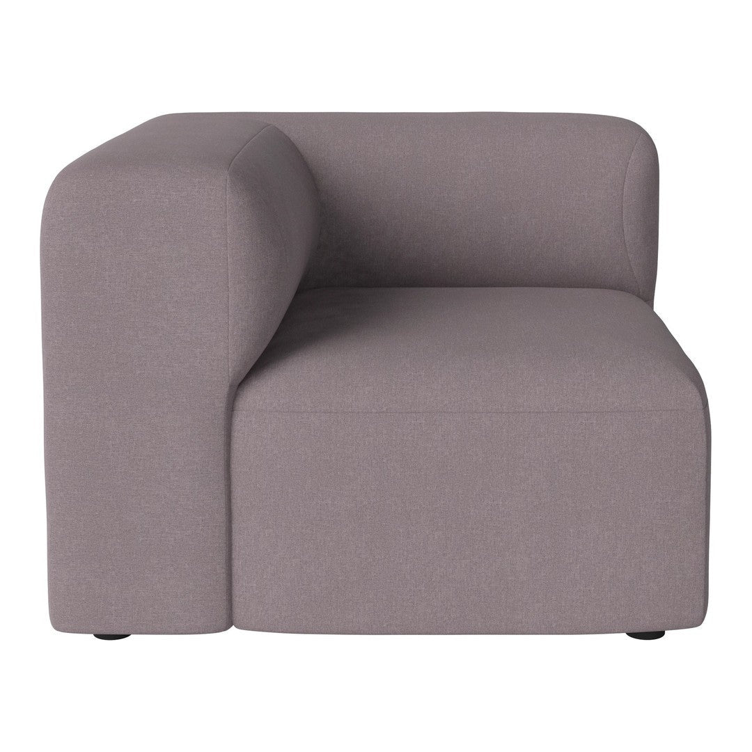 Curved gray accent chair with a smooth fabric finish, perfect for modern decor. Minimalist design with solid color.