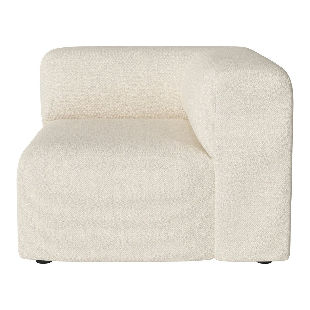 "Modern cream-colored fabric sofa with a minimalist design and textured surface."
