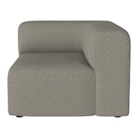 Light gray, textured fabric corner sofa section with a minimalist design and smooth, curved lines.