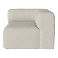 Light beige corner sofa with soft texture and modern, minimalist design. Perfect for contemporary living spaces.