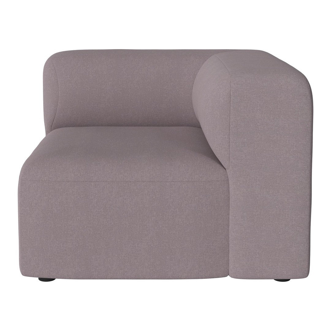 Soft gray corner chair with a minimalist design and smooth fabric texture. Ideal for modern living spaces.