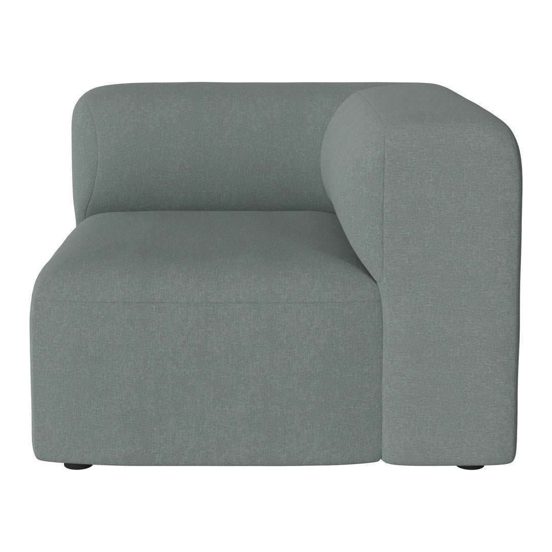 Textured light teal sectional sofa with a modern design and clean lines, perfect for contemporary living spaces.