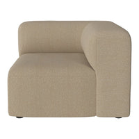 Beige textured fabric armchair with a modern, minimalist design and soft, rounded edges.