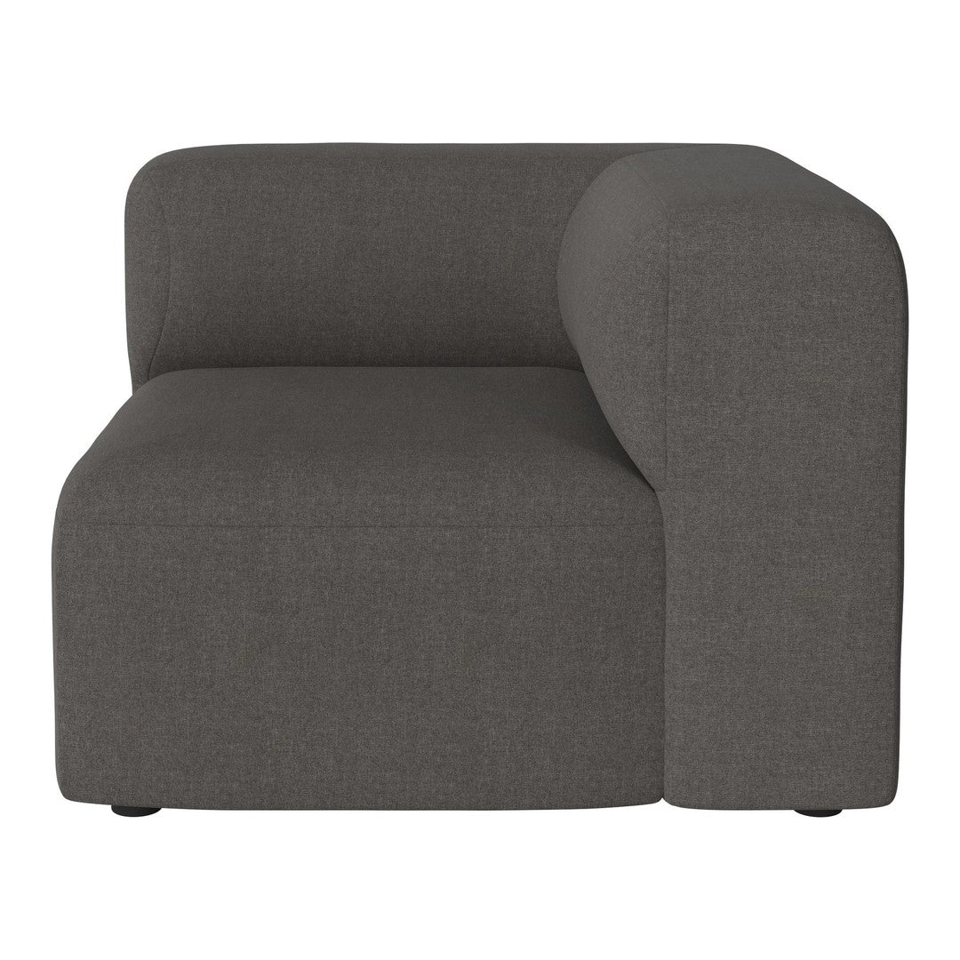 Gray upholstered corner chair with a smooth, modern texture and minimalist design. Perfect for contemporary decor.