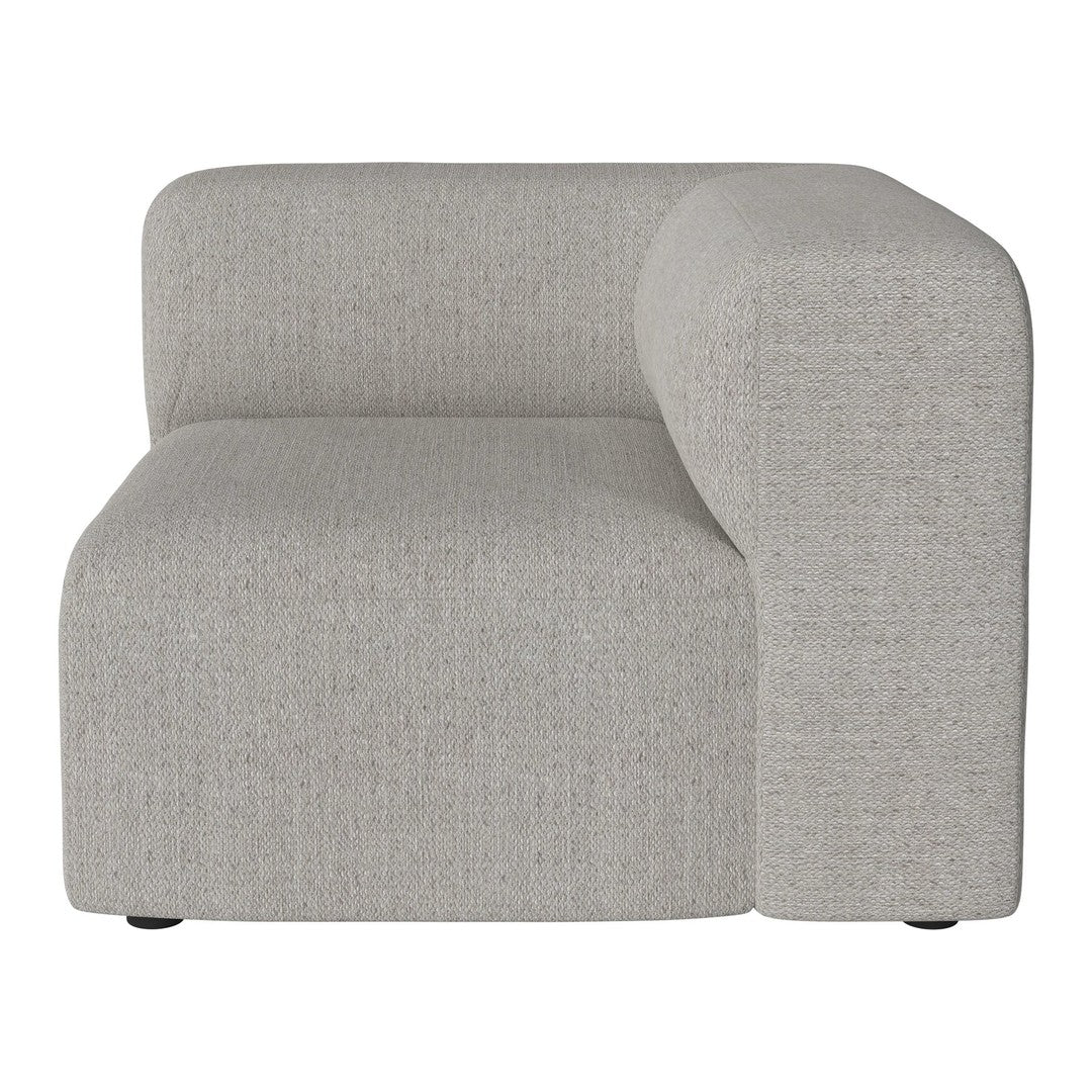 Light gray corner sofa with a soft, textured fabric and minimalist design. Perfect for modern living spaces.