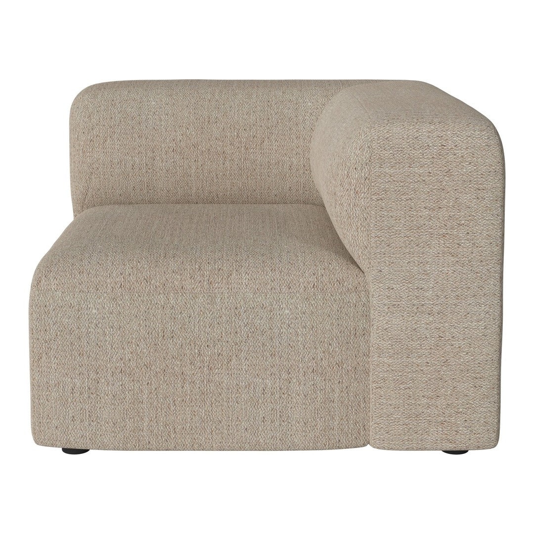 Beige textured upholstery with a subtle speckled pattern on a modern corner sofa segment.