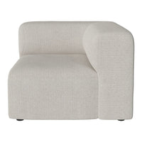 Light beige curved sofa section with a smooth, textured fabric and minimalistic design. Ideal for modern interiors.