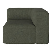 Green textured sofa with a modern, curved design and understated patterns for a stylish living space.