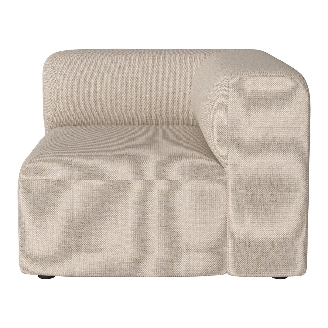 Beige textured sofa section with a modern minimalist design featuring smooth, rounded edges.