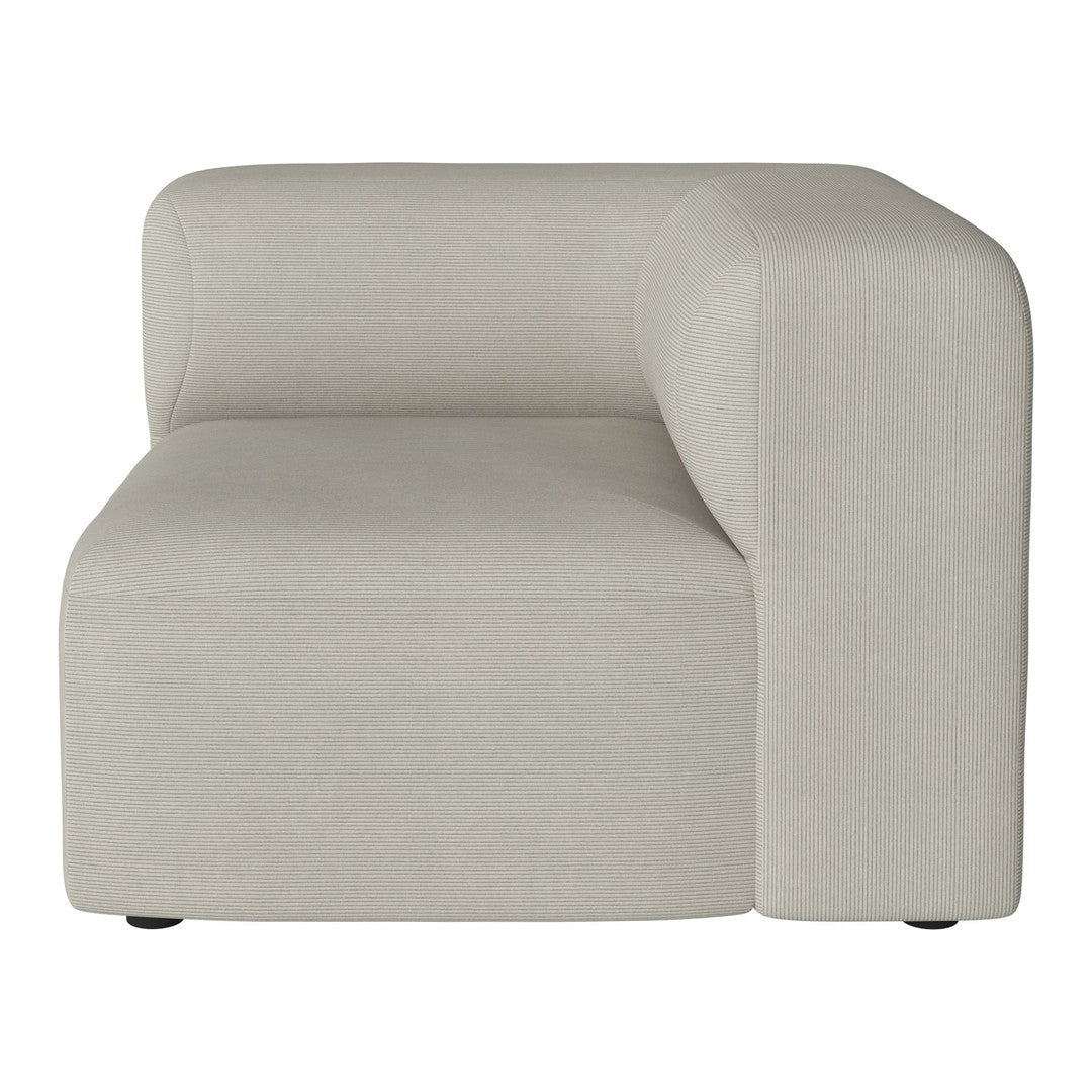 Light beige upholstered corner sofa with a smooth, minimalist design and no visible patterns.