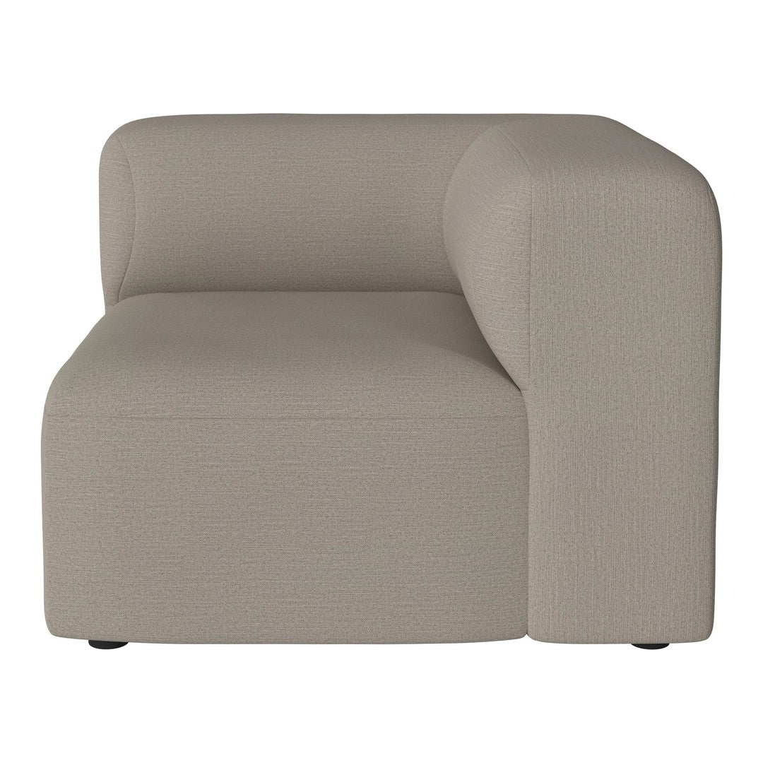 Beige modular sofa section with a smooth, textured fabric and a contemporary, minimalist design.