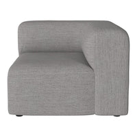 Light gray upholstered corner sofa with a smooth, minimalist design and subtle texture.
